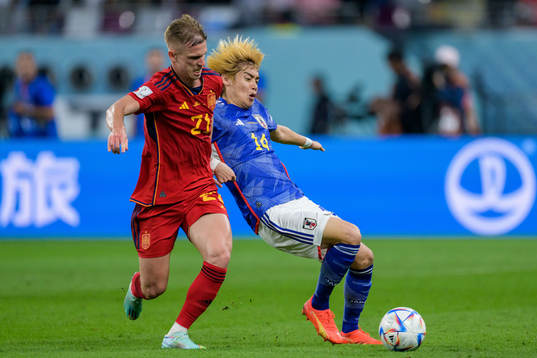 Dani Olmo of Spain and Junya Ito of Japan