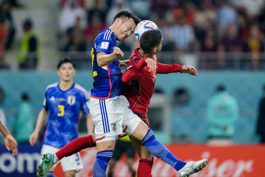 Maya Yoshida of Japan and Ferran Torres of Spain