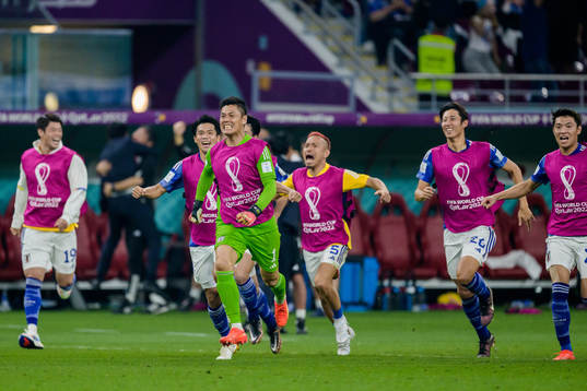 goalkeeper Eiji Kawashima of Japan celebrates