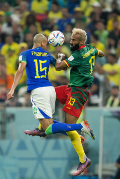 Fabinho of Brazil and Eric Maxim Choupo-Moting of Cameroon