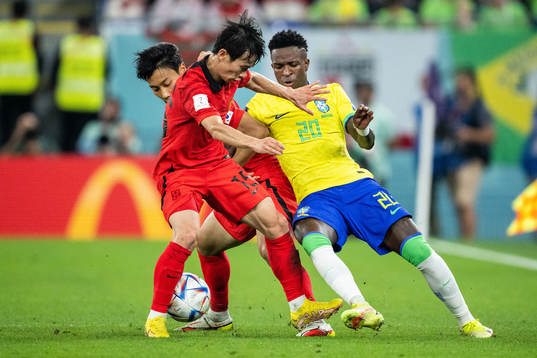 Vinicius Junior of Brazil against Seungho Paik and Moonhwan