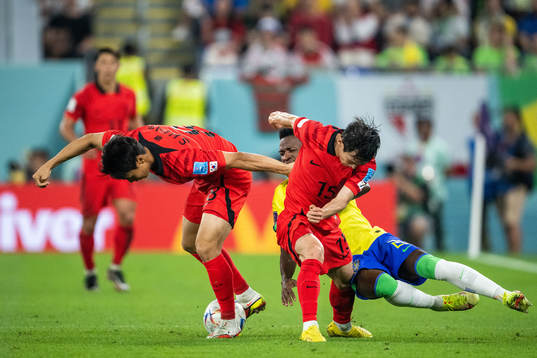 Vinicius Junior of Brazil against Seungho Paik and Moonhwan