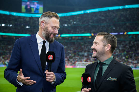 Swedish TV4 broadcast reporters Olof Lundh and Gusten Dahlin pose for a photo