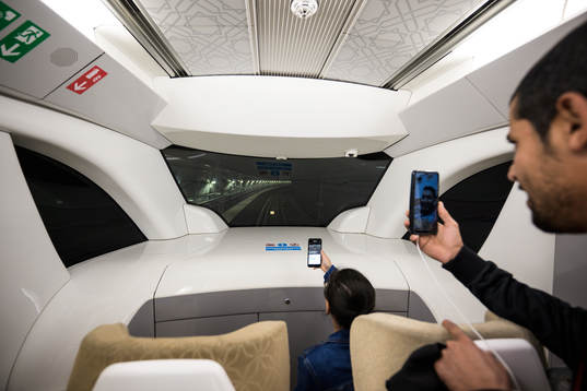 Passengers travel in a Gold car on the Gold line metro