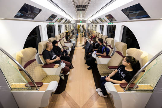 Passengers travel in a Gold car on the Gold line metro
