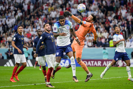 Marcus Rashford of England and goalkeeper Hugo Lloris of