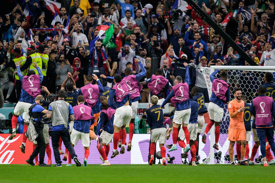 Players of France celebrate