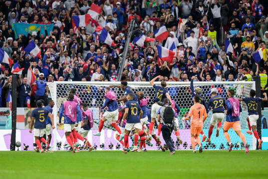 Players of France celebrate