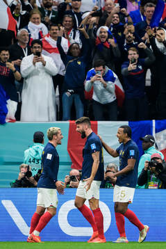 Antoine Griezmann, Olivier Giroud and Jules Kounde of France celebrate the 1-2 goal