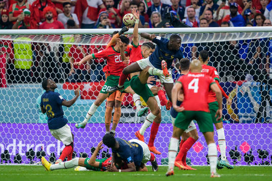 goalkeeper Hugo Lloris of France against Achraf Dari of