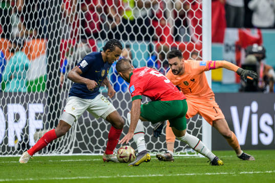 Jules Kounde and goalkeeper Hugo Lloris of France against