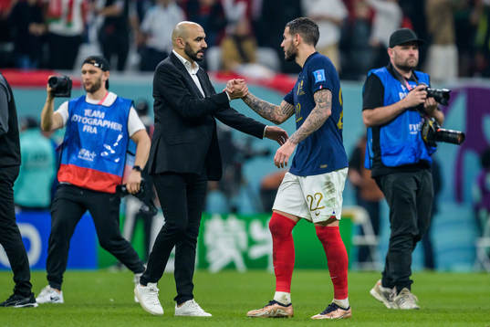 head coach Walid Regragui of Morocco and Theo Hernandez of France