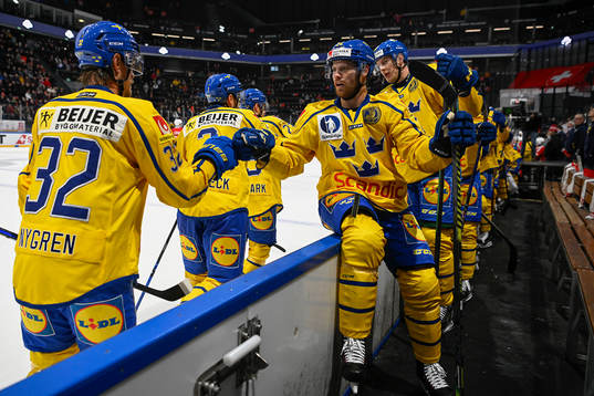 Players of Sweden celebrate
