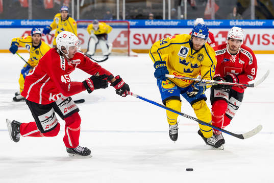 Oscar Eklind of Sweden against Michael Fora and Damien Riat