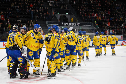 Players of Sweden celebrate