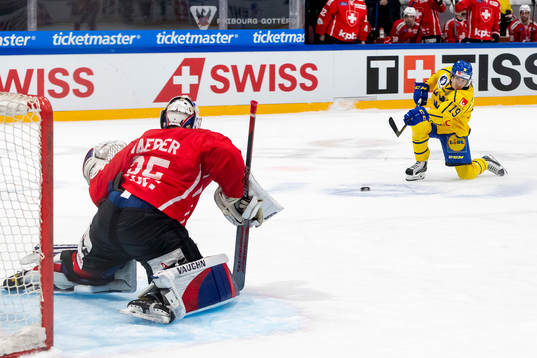 Marcus Sörensen of Sweden scores the 3-2 goal against
