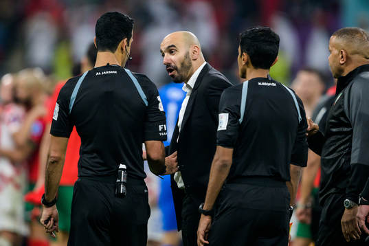 head coach Walid Regragui of Morocco and Referee Abdulrahman Al Jassim