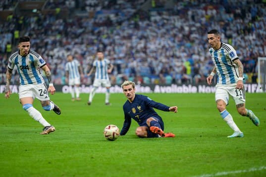 Enzo Fernandez and Angel de Maria of Argentina against