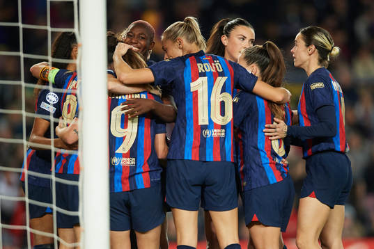 Marta Torrejon of FC Barcelona celebrates with teammates