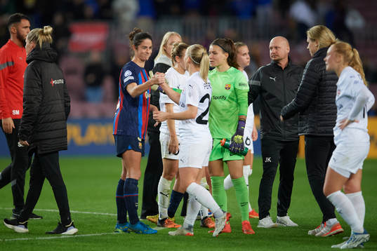 Marta Torrejon of FC Barcelona and Mia Persson of FC