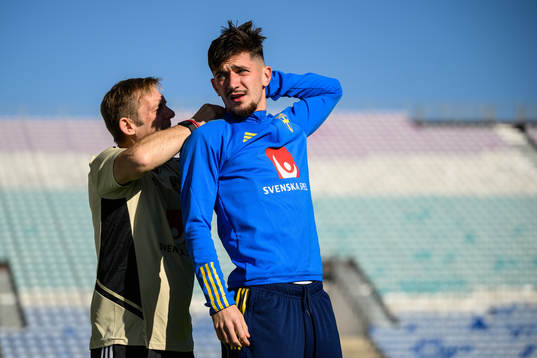 performance manager Paul Balsom and Armin Gigovic of the Swedish men's football national team at a training session