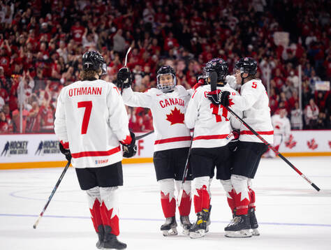 Connor Bedard of Canada celebrates the 0-1 goal by Dylan