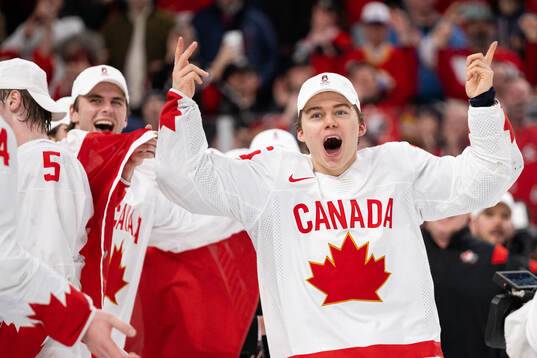 Connor Bedard of Canada celebrates