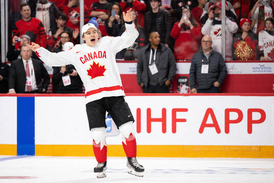 Connor Bedard of Canada celebrates