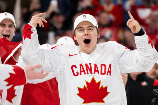 Connor Bedard of Canada celebrates