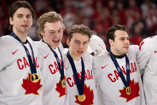 Connor Bedard of Canada celebrates