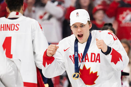 Connor Bedard of Canada celebrates