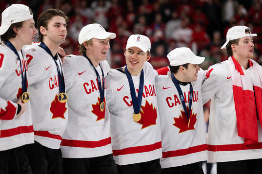 Connor Bedard of Canada celebrates