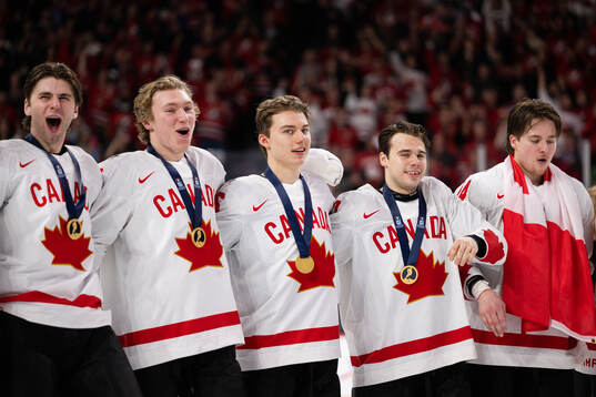 Connor Bedard of Canada celebrates