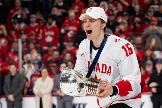 Connor Bedard of Canada celebrates