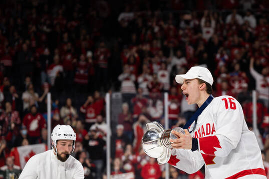 Connor Bedard of Canada celebrates