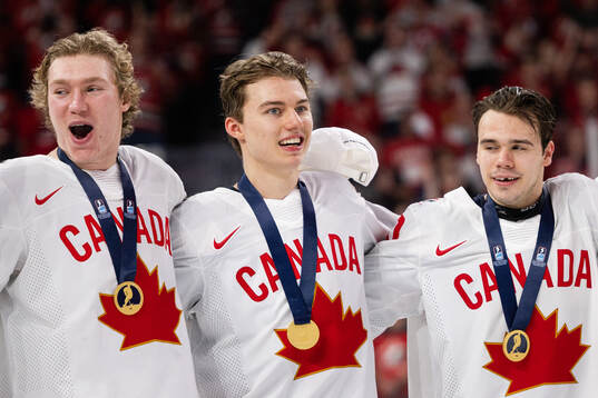 Connor Bedard of Canada celebrates