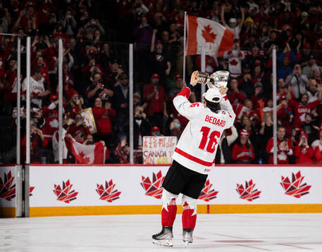 Connor Bedard of Canada celebrates
