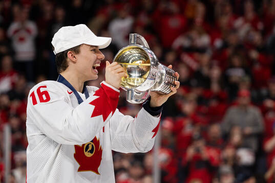Connor Bedard of Canada celebrates