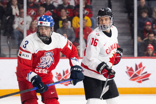 David Spacek of Czech Republic and Connor Bedard of Canada