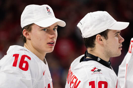 Connor Bedard of Canada celebrates