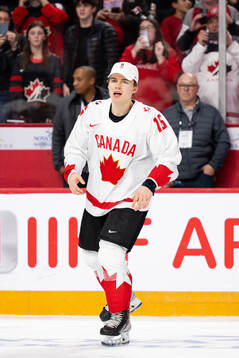 Connor Bedard of Canada celebrates