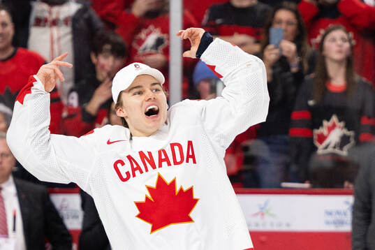 Connor Bedard of Canada celebrates