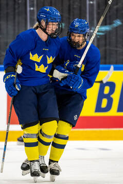Astrid Lindeberg and Tilde Utbult of Sweden celebrate at a