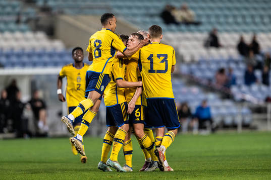 Elias Andersson, Bilal Hussein and Gustaf Lagerbielke of Sweden celebrate after 1-1