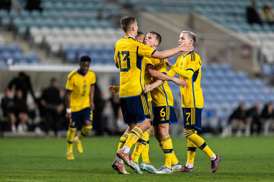Elias Andersson, Gustaf Lagerbielke and Jacob Ondrejka of Sweden celebrate after 1-1