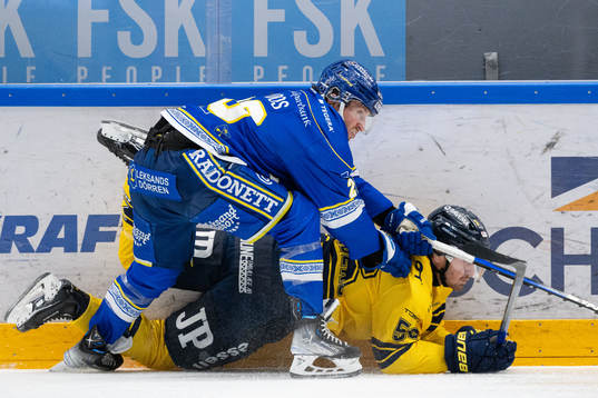 Leksands Justin Glenn Kloos och HV71s Fredrik Forsberg