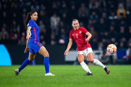 Delphine Cascarino of France and Marit Bratberg Lund of