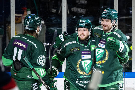 Färjestads Axel Bergkvist jublar med Joakim Nygård och
