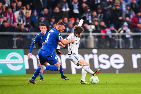 Jesper Karlström of Lech Poznan and Oliver Berg of