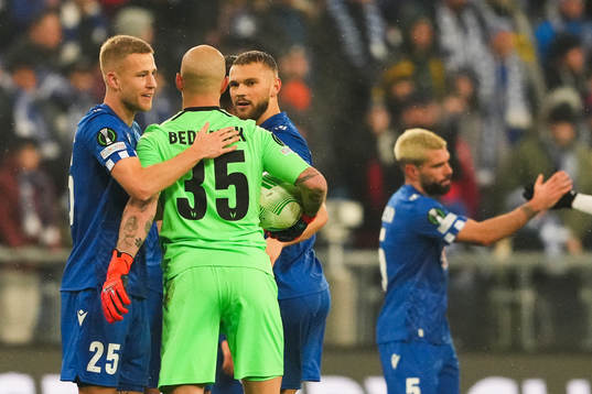 Filip Dagerstål, goalkeeper Filip Bednarek and Jesper Karlström of Lech Poznan celebrate